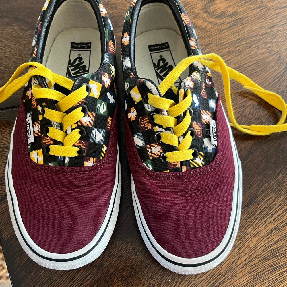 Vans Red Sneakers with Black Checkered Pattern and White Rubber Sole.